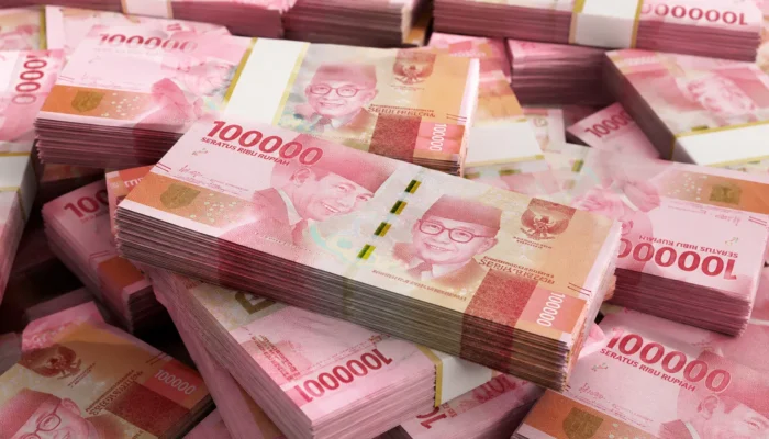 Rupiah Terpukul, Dolar AS Kembali ke Level Rp18.000