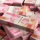 Rupiah Terpukul, Dolar AS Kembali ke Level Rp18.000