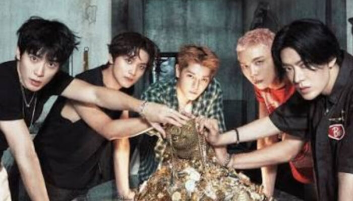 NCT 127 Pamer Foto Full Group dengan Tumpukan Jam