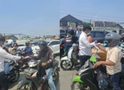 Antisipasi Bahaya Debu Vulkanik Gunung Anak Krakatau, KPP Bogor Raya dan KONI Bagikan Ribuan Masker di Kemang